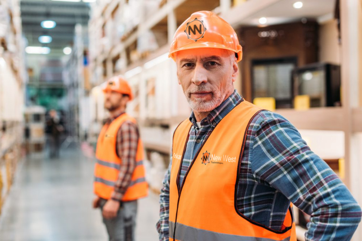 Man wearing hard hat and vest